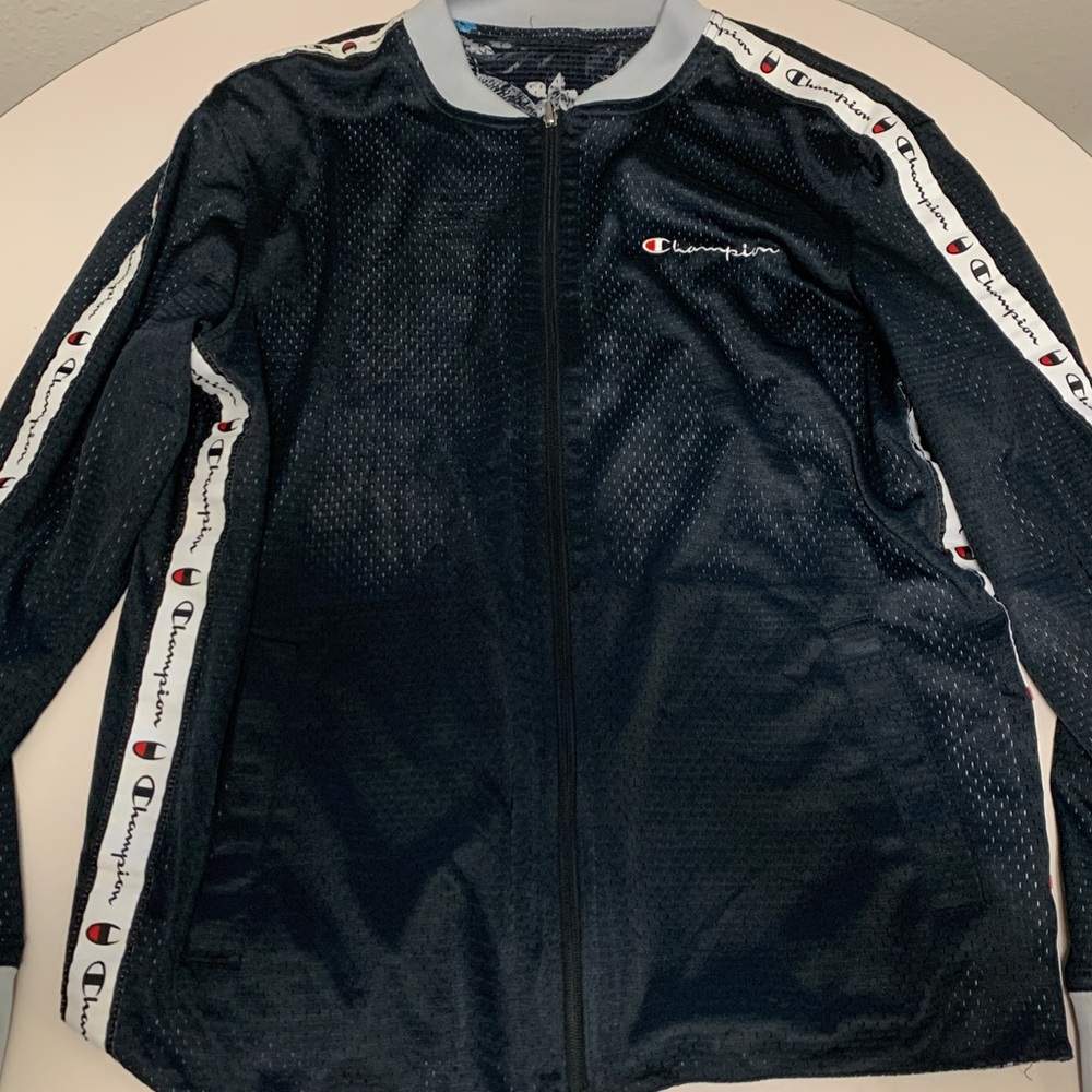 Reversible Mesh Bomber Champions zip up jacket.